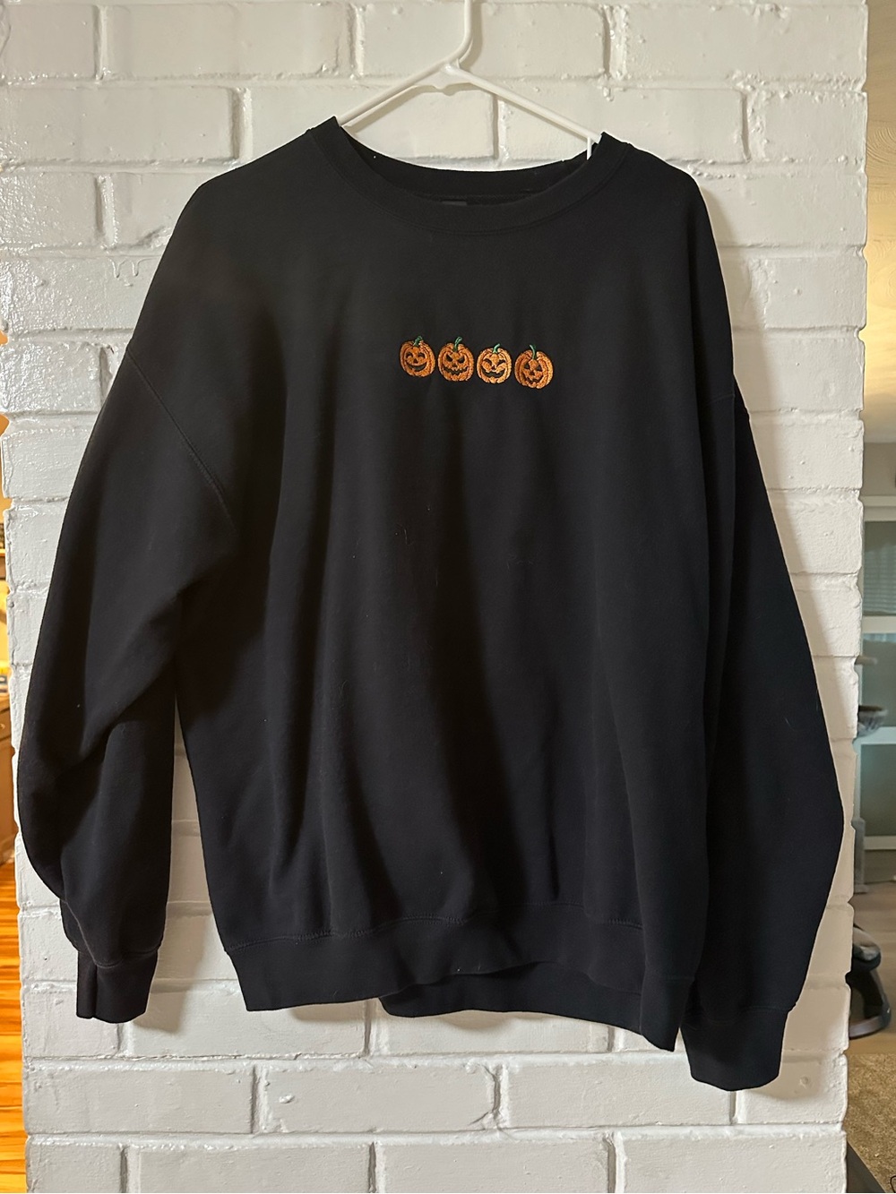 Gildan Black Crewneck Sweatshirt with Orange Pumpkin Embroidery